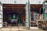 Diesel locomotives inside the barn